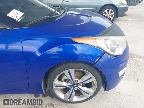 2012 Hyundai Veloster w/Gray Int z VIN KMHTC6AD0CU034683, wystawiony jako IAAI lot #42395112 z przebiegiem 134 388 mil mil oraz . Historia ofert i sprzedaży dostępna na DreamBid. Obrazek 15.