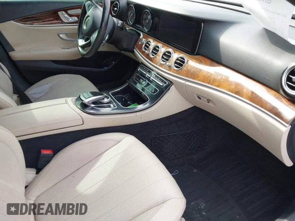 2017 Mercedes-Benz E-Class E 300 Luxury with VIN WDDZF4KB2HA072437, listed as a IAAI auction lot 42008813 with 102,389 mi miles. Bid and sale history available at carsss.com. Image 5.
