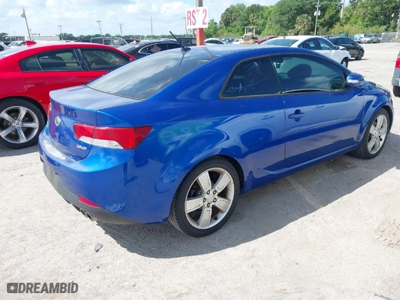 2010 Kia Forte Koup SX with VIN KNAFW6A35A5243146, listed as a IAAI auction lot 41954948 with 101765 miles. Bid and sale history available at carsss.com. Image 4.