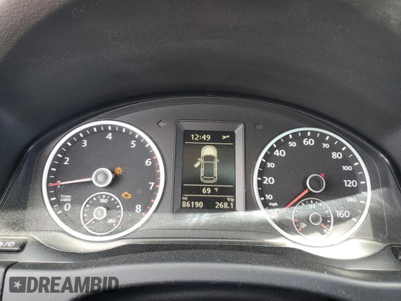 2013 Volkswagen Tiguan SE z VIN WVGAV7AX4DW523112, wystawiony jako Copart lot #53261855 z przebiegiem 86 190 mil mil oraz Szkoda całkowita • Salvage title. Historia ofert i sprzedaży dostępna na DreamBid. Obrazek 9.
