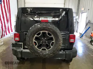 2015 Jeep Wrangler Unlimited Rubicon with VIN 1C4BJWFG3FL653961, listed as a Copart auction lot 47497135 with 97,707 mi miles and Clean title. Bid and sale history available at DreamBid. Image 6.