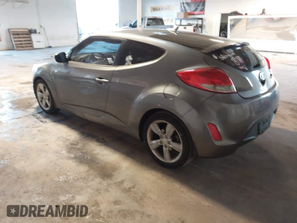 2013 Hyundai Veloster w/Gray Int with VIN KMHTC6AD4DU117924, listed as a IAAI auction lot 41339465 with 156,004 mi miles. Bid and sale history available at carsss.com. Image 3.