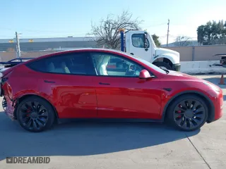 2021 Tesla Model Y Performance with VIN 5YJYGDEF5MF211592, listed as a IAAI auction lot 41766033 with 59,694 mi miles. Bid and sale history available at carsss.com. Image 14.