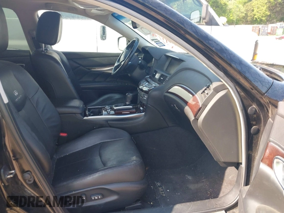 2012 Infiniti M with VIN JN1BY1AP7CM331533, listed as a IAAI auction lot 42149759 with 123,186 mi miles. Bid and sale history available at carsss.com. Image 5.