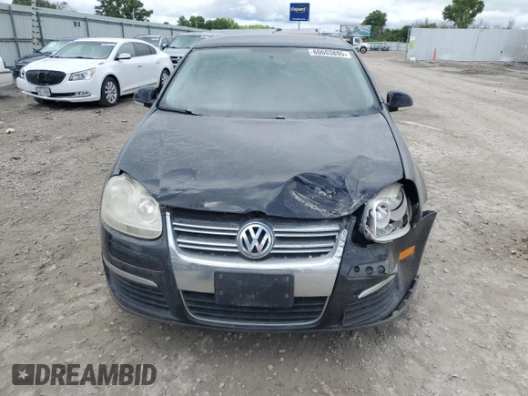 2009 Volkswagen Jetta SE with VIN 3VWRM71K49M172348, listed as a Copart auction lot 60603895 with 129,515 mi miles and Salvage title. Bid and sale history available at DreamBid. Image 5.