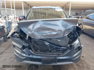 2017 Hyundai Tucson Value with VIN KM8J33A23HU472898, listed as a IAAI auction lot 41634205 with 81,690 mi miles. Bid and sale history available at carsss.com. Image 13.