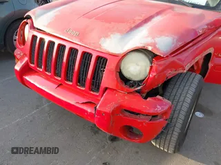 2003 Jeep Liberty Limited with VIN 1J4GK58K13W713271, listed as a IAAI auction lot 42091786 with 165,088 mi miles and . Bid and sale history available at carsss.com. Image 6.