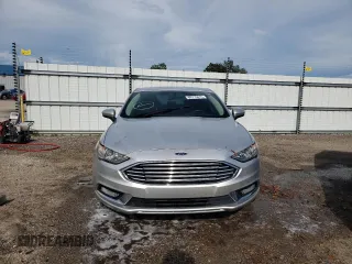 2017 Ford Fusion SE z VIN 3FA6P0H76HR184188, wystawiony jako Copart lot #60719075 z przebiegiem 105 377 mil mil oraz Czysty tytuł • Clean title. Historia ofert i sprzedaży dostępna na DreamBid. Obrazek 5.