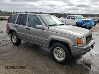 1997 Jeep Grand Cherokee Limited with VIN 1J4GZ78Y0VC682949, listed as a Copart auction lot 82152424 with 194,576 mi miles and Salvage Title. Bid and sale history available at carsss.com. Image 4.