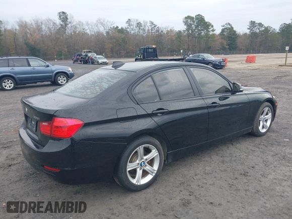 2015 BMW 3 Series 328i with VIN WBA3A5C5XFF608822, listed as a IAAI auction lot 41439719 with 71,830 mi miles. Bid and sale history available at carsss.com. Image 4.