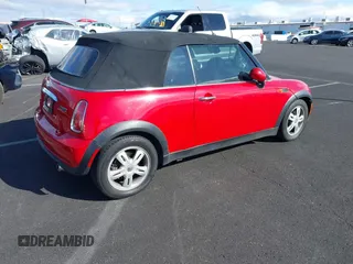 2007 MINI Convertible with VIN WMWRF33527TG17570, listed as a IAAI auction lot 41818884 with 103,447 mi miles and . Bid and sale history available at DreamBid. Image 4.