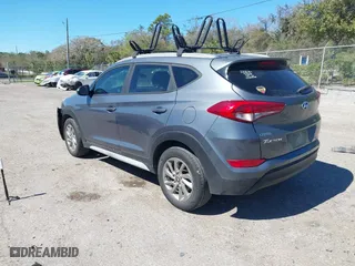 2017 Hyundai Tucson SE Plus with VIN KM8J33A45HU452928, listed as a IAAI auction lot 41601229 with 114,949 mi miles. Bid and sale history available at carsss.com. Image 3.