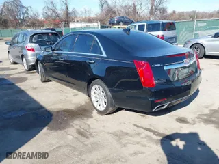 2016 Cadillac CTS Sedan AWD with VIN 1G6AW5SX8G0198009, listed as a IAAI auction lot 41437238 with 54,882 mi miles. Bid and sale history available at carsss.com. Image 3.
