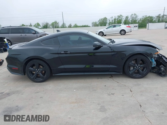 2021 Ford Mustang GT z VIN 1FA6P8CF2M5149691, wystawiony jako IAAI lot #41937878 z przebiegiem 57 865 mil mil oraz . Historia ofert i sprzedaży dostępna na DreamBid. Obrazek 13.