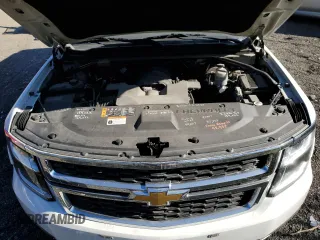 2020 Chevrolet Suburban Commercial with VIN 1GNSKKEC4LR213767, listed as a Copart auction lot 76527014 with 142,132 mi miles and Clean Title. Bid and sale history available at carsss.com. Image 12.