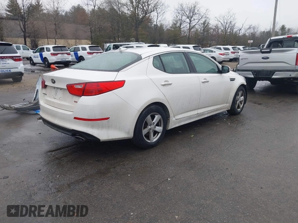 2015 Kia Optima LX with VIN KNAGM4A70F5571034, listed as a IAAI auction lot 41734211 with 214,948 mi miles. Bid and sale history available at carsss.com. Image 4.
