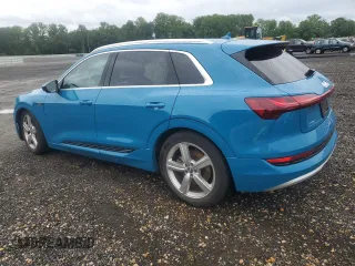 2019 Audi e-tron Premium Plus с VIN WA1LAAGE7KB013766, выставлен на аукционе Copart как лот 57432775 с пробегом 18 657 миль миль и Списание • Salvage title. История ставок и продаж доступна на DreamBid. Изображение 2.