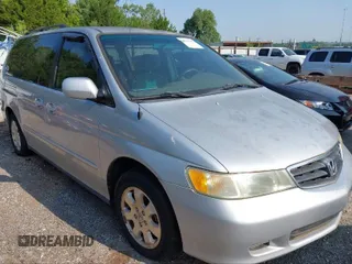 2003 Honda Odyssey EX z VIN 5FNRL18613B111952, wystawiony jako IAAI lot #40852383 z przebiegiem Nie podano mil oraz . Historia ofert i sprzedaży dostępna na DreamBid. Obrazek 1.