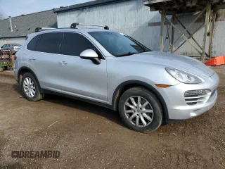 2011 Porsche Cayenne with VIN WP1AA2A22BLA06959, listed as a Copart auction lot 52305775 with 150,314 mi miles and Clean title. Bid and sale history available at DreamBid. Image 4.