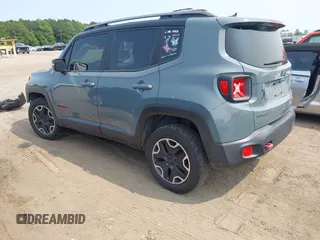 2015 Jeep Renegade Trailhawk with VIN ZACCJBCT0FPC01671, listed as a IAAI auction lot 42406869 with Not provided miles and . Bid and sale history available at DreamBid. Image 3.