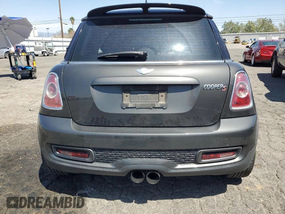 2012 MINI Hardtop S with VIN WMWSV3C53CTY29714, listed as a Copart auction lot 52370175 with 94,536 mi miles and Salvage title. Bid and sale history available at DreamBid. Image 6.