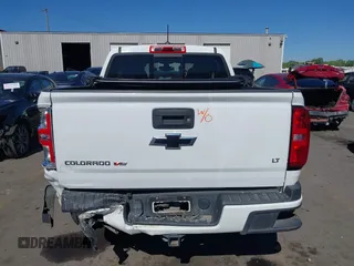 2018 Chevrolet Colorado 4WD LT with VIN 1GCGTCEN4J1297748, listed as a IAAI auction lot 42181410 with 92,649 mi miles and . Bid and sale history available at DreamBid. Image 16.