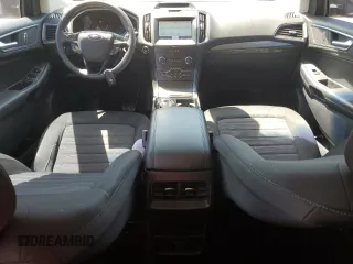 2020 Ford Edge SE z VIN 2FMPK3G91LBA11070, wystawiony jako Copart lot #51683775 z przebiegiem 72 511 mil mil oraz Czysty tytuł • Clean title. Historia ofert i sprzedaży dostępna na DreamBid. Obrazek 8.
