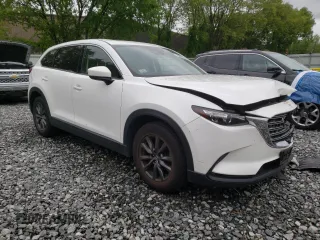 2022 Mazda CX-9 Touring with VIN JM3TCBCYXN0619317, listed as a Copart auction lot 58264755 with 139,478 mi miles and Salvage title. Bid and sale history available at DreamBid. Image 4.