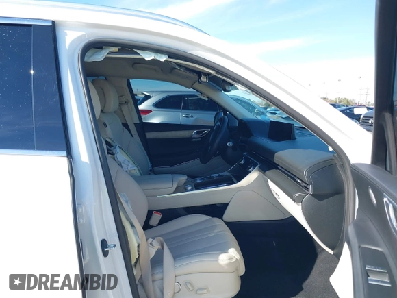 2023 Genesis GV80 with VIN KMUHBDSB0PU140228, listed as a IAAI auction lot 41253270 with 33,467 mi miles and . Bid and sale history available at DreamBid. Image 5.
