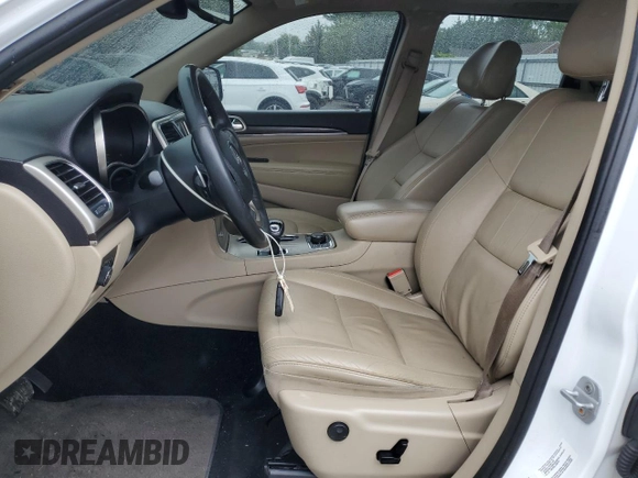 2014 Jeep Grand Cherokee Limited with VIN 1C4RJFBG9EC200141, listed as a Copart auction lot 60507385 with 101,917 mi miles and Salvage title. Bid and sale history available at DreamBid. Image 7.