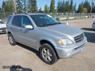 2002 Mercedes-Benz M-Class with VIN 4JGAB75E22A364537, listed as a IAAI auction lot 42119184 with 222,372 mi miles. Bid and sale history available at carsss.com. Image 1.