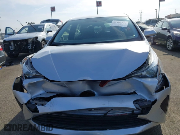 2016 Toyota Prius Two z VIN JTDKBRFU1G3016850, wystawiony jako IAAI lot #41163246 z przebiegiem 68 858 mil mil oraz . Historia ofert i sprzedaży dostępna na DreamBid. Obrazek 12.