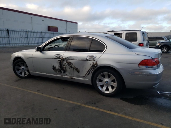 2006 BMW 7 Series 750i with VIN WBAHL83586DT05258, listed as a Copart auction lot 77033744 with 129,376 mi miles and Salvage Title. Bid and sale history available at DreamBid. Image 2.