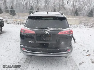 2017 Toyota RAV4 SE with VIN 2T3JFREV5HW591932, listed as a IAAI auction lot 41628183 with 142,599 mi miles. Bid and sale history available at carsss.com. Image 16.