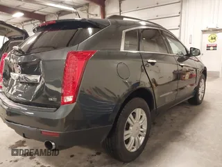2014 Cadillac SRX with VIN 3GYFNAE34ES665630, listed as a IAAI auction lot 41315281 with 99,009 mi miles and . Bid and sale history available at DreamBid. Image 4.