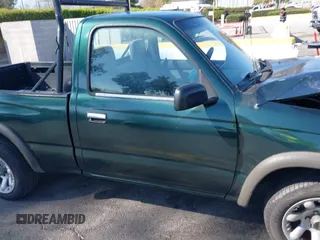 1999 Toyota Tacoma with VIN 4TANL42N7XZ481489, listed as a IAAI auction lot 40365153 with 218,971 mi miles. Bid and sale history available at carsss.com. Image 13.