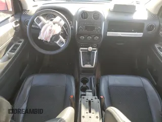 2016 Jeep Compass Latitude with VIN 1C4NJDEB8GD691124, listed as a Copart auction lot 48201175 with 136,842 mi miles and Salvage Title. Bid and sale history available at carsss.com. Image 8.