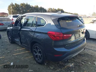 2018 BMW X1 xDrive28i with VIN WBXHT3C32J5L31896, listed as a IAAI auction lot 41675944 with 47,190 mi miles. Bid and sale history available at carsss.com. Image 3.