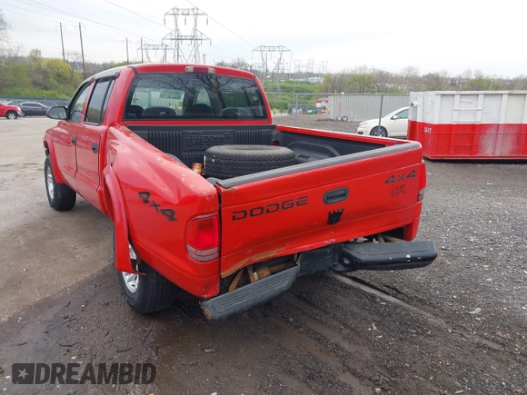 2003 Dodge Dakota Sport with VIN 1D7HG38X63S212434, listed as a IAAI auction lot 42030739 with 181,098 mi miles and . Bid and sale history available at DreamBid. Image 13.