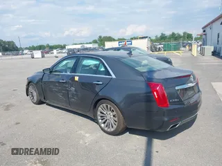 2014 Cadillac CTS Luxury AWD z VIN 1G6AX5SX7E0173466, wystawiony jako IAAI lot #42187266 z przebiegiem 115 140 mil mil oraz . Historia ofert i sprzedaży dostępna na DreamBid. Obrazek 3.