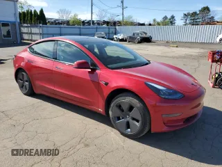 2023 Tesla Model 3 with VIN 5YJ3E1EAXPF598079, listed as a Copart auction lot 55199405 with Not provided miles and Salvage title. Bid and sale history available at DreamBid. Image 4.