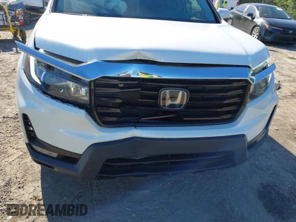 2021 Honda Ridgeline RTL-E with VIN 5FPYK3F7XMB011525, listed as a IAAI auction lot 41774012 with 98,031 mi miles and . Bid and sale history available at DreamBid. Image 6.