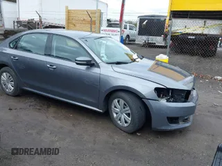 2015 Volkswagen Passat 1.8T Wolfsburg Ed with VIN 1VWAT7A37FC026077, listed as a IAAI auction lot 41630524 with 136,966 mi miles. Bid and sale history available at carsss.com. Image 1.