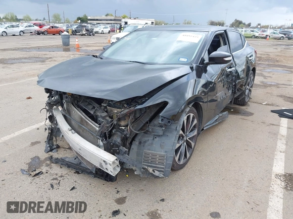2016 Nissan Maxima SV z VIN 1N4AA6AP8GC408857, wystawiony jako IAAI lot #41892425 z przebiegiem 185 487 mil mil oraz . Historia ofert i sprzedaży dostępna na DreamBid. Obrazek 6.