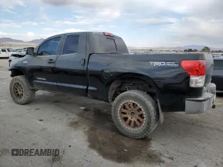 2013 Toyota Tundra z VIN 5TFUY5F17DX318332, wystawiony jako Copart lot #88794955 z przebiegiem 113 064 mil mil oraz Szkoda całkowita • Salvage title. Historia ofert i sprzedaży dostępna na DreamBid. Obrazek 2.