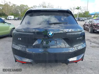 2025 BMW iX xDrive50 with VIN WB523CF04SCT06575, listed as a IAAI auction lot 41525744 with 732 mi miles. Bid and sale history available at carsss.com. Image 16.