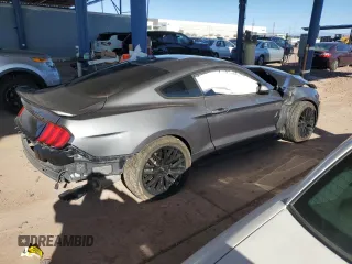 2021 Ford Mustang GT z VIN 1FA6P8CF9M5103856, wystawiony jako Copart lot #49406715 z przebiegiem 27 499 mil mil oraz Szkody całkowita. Historia ofert i sprzedaży dostępna na DreamBid. Obrazek 3.