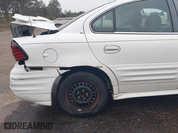 2002 Pontiac Grand Am SE1 z VIN 1G2NF52F82C203744, wystawiony jako IAAI lot #41770625 z przebiegiem 177 630 mil mil oraz . Historia ofert i sprzedaży dostępna na DreamBid. Obrazek 18.