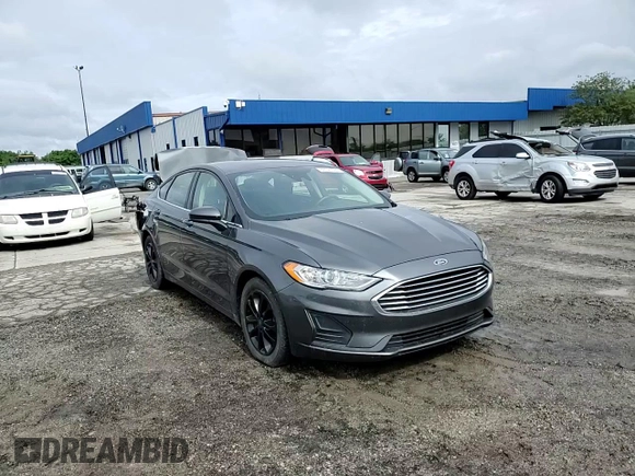 2020 Ford Fusion SE z VIN 3FA6P0HD1LR252332, wystawiony jako Copart lot #58123365 z przebiegiem 76 410 mil mil oraz Szkoda całkowita • Salvage title. Historia ofert i sprzedaży dostępna na DreamBid. Obrazek 13.
