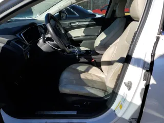 2016 Ford Fusion Titanium with VIN 3FA6P0K93GR287108, listed as a Copart auction lot 87905495 with 91,184 mi miles and Salvage Title. Bid and sale history available at DreamBid. Image 7.
